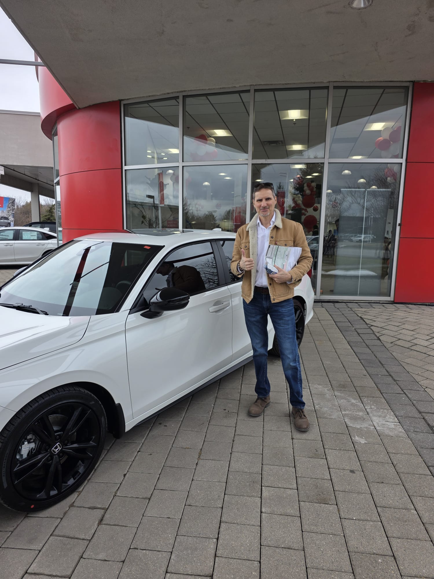 Happy Car Help Canada client with their new car
